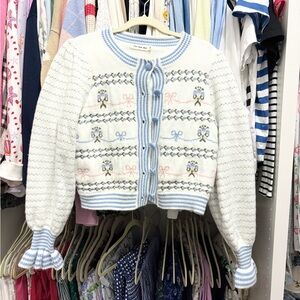 White and Blue Knit Cardigan with Bow Pattern